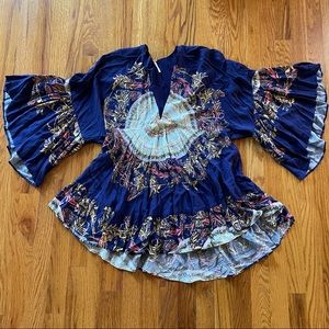 Free People navy blue v-neck flared top with wide sleeves and colorful design